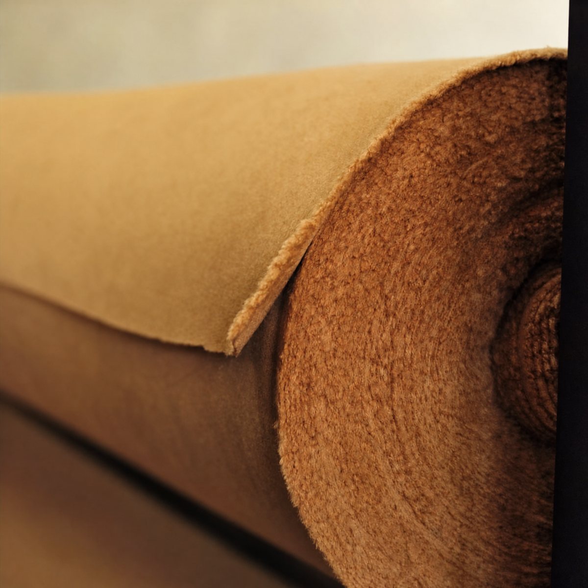 Close view of natural cashmere material and source landscape